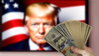 إعلان أمريكي عن أوراق دولار بتوقيع ترامب يثير نقاشاً سياسياً