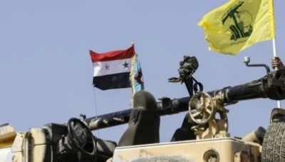 تقليص وجود "حزب الله" في سوريا وتبديل المواقع مع "الحشد الشعبي" العراقي