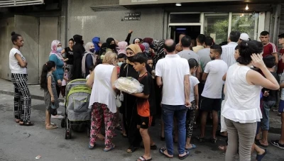 لبنانيون يأتون إلى سوريا بحثاً عن الخبز