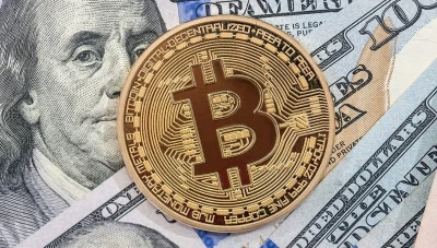 بيتكوين تعاود الارتفاع وتتجاوز 35 ألف دولار في أعلى مستوى لها منذ 17 شهرًا