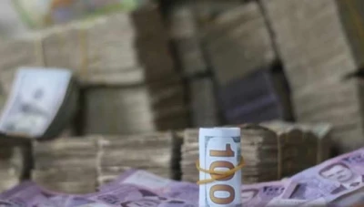 باحثة اقتصادية: هذا القرار يؤدي إلى إحجام المواطنين عن التعامل مع المصارف!