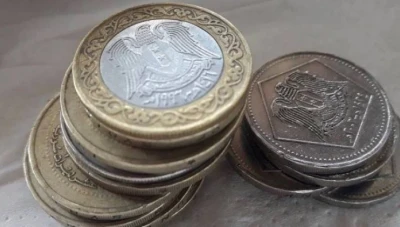 سعر صرف الليرة السورية والذهب امام بعض العملات في أسواق دمشق وحلب