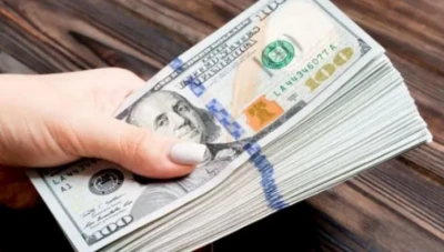 الدولار يهبط بعد تعزيز المركزي الأمريكي للإقراض وتراجع مخاوف كورونا