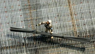 إيران تطرح على النظام السوري إقامة مصانع مواد بناء