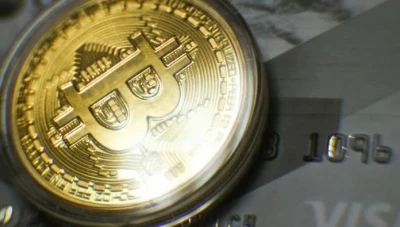 عملة "بيتكوين" تقفز لأول مرة منذ عام لتصل إلى 12 ألف دولار