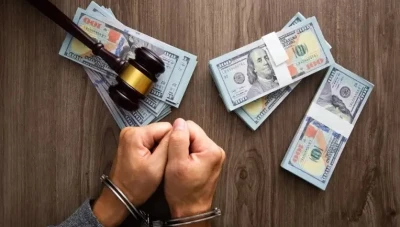 مصر... القاء القبض على رجل أعمال وشقيقه بتهمة التجارة غير المشروعة بالنقد الأجنبي وضبطهما بحوزتهما شيكلات إسرائيلية.