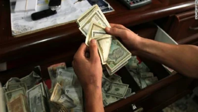 صرافات تأخـذ مـبالغ مالـية دون صرفها للمستخدمين