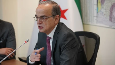 هـادي البـحرة: فتـرة انتقـالية لمـدة 18 شـهراً تمـهـيداً لانتـخـابات حـرة في سوريا