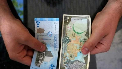 تراجع الاحتياطي يسلط الضوء على تحديات الليرة السورية