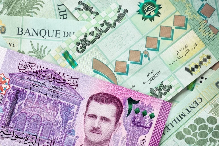 تقرير يكـ.ـشف اسباب انهـ.ـيار الليرتين السورية واللبنانية