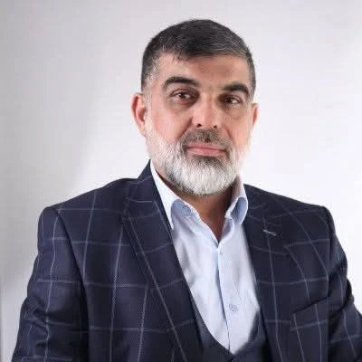 تعيين الدكتور عماد الدين الرشيد عميدًا لكلية الشريعة بجامعة دمشق: مسيرة علمية وسياسية متميزة